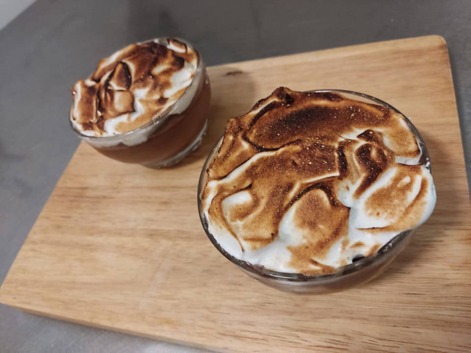 Home-made chocolate trifle topped with home-made torched meringue